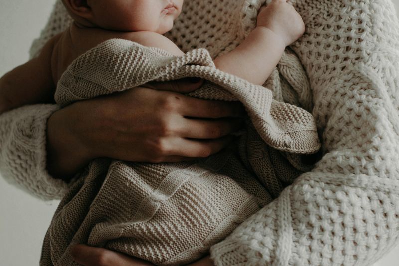 “You’re holding her too much—she’ll get spoiled.”